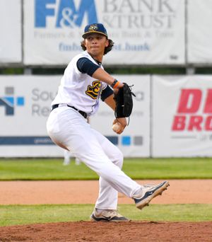 Joe throws a pitch for the Burlington Bees.